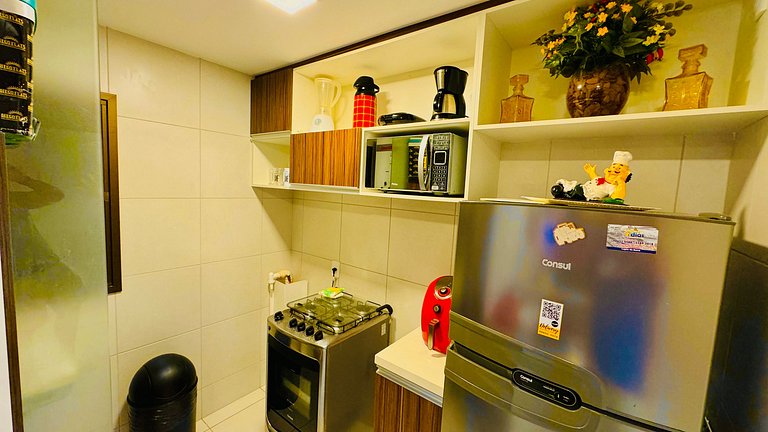 Apartamento com vista para a piscina e acesso direto à praia