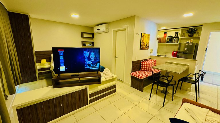 Apartamento com vista para a piscina e acesso direto à praia