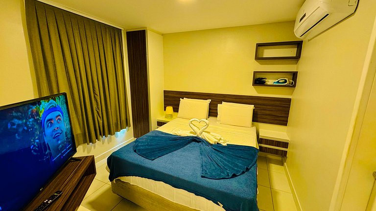 Apartamento com vista para a piscina e acesso direto à praia