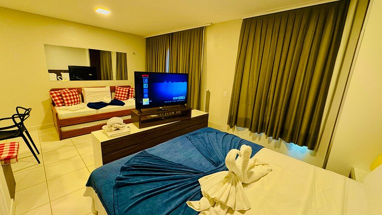 Apartamento com vista para a piscina e acesso direto à praia