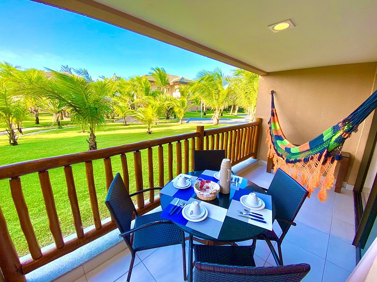 Bangalô com dois quartos, vista para o jardim e lavadora de