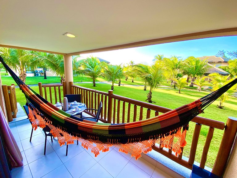 Bangalô com dois quartos, vista para o jardim e lavadora de