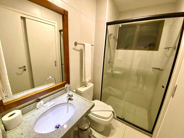 Bangalô com dois quartos, vista para o jardim e lavadora de