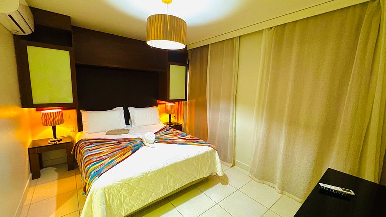 Bangalô com dois quartos, vista para o jardim e lavadora de