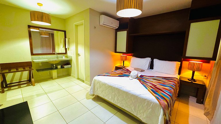 Bangalô com 2 quartos, vista para o jardim e máquina de lava