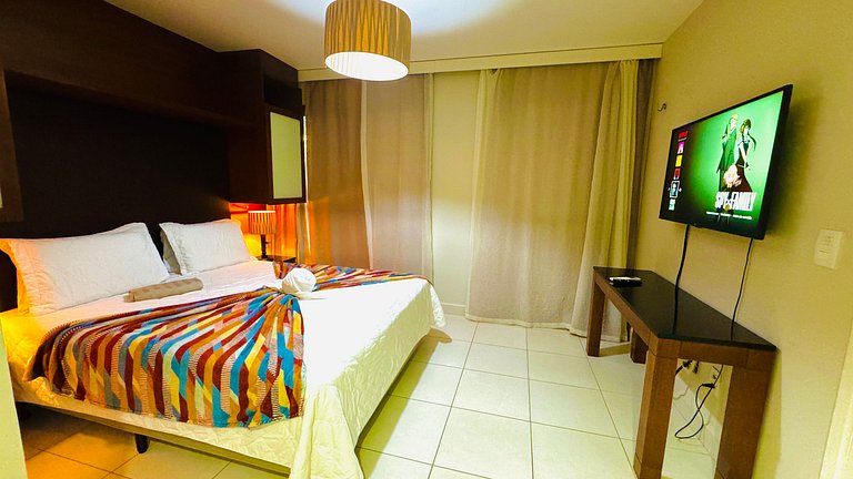 Bangalô com dois quartos, vista para o jardim e lavadora de