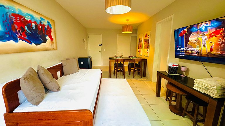 Bangalô com dois quartos, vista para o jardim e lavadora de