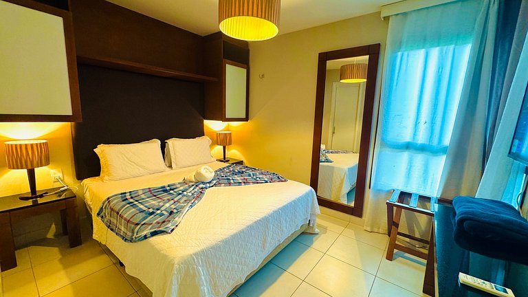 Bangalô com dois quartos, vista para o jardim e lavadora de